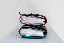 Load image into Gallery viewer, Hand embossed traveler&#39;s journal (blue/purple) by Frances Cardinale
